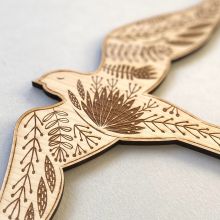 Etched wooden bird decoration